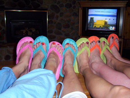 Three of my friends and I celebrated pedicures at a cabin retreat in 2004.  That's when I first got the turquoise slippers--and I'm still wearing them nine years later.  I know--ewww! And, I wear them while riding bike.  But not on purpose.